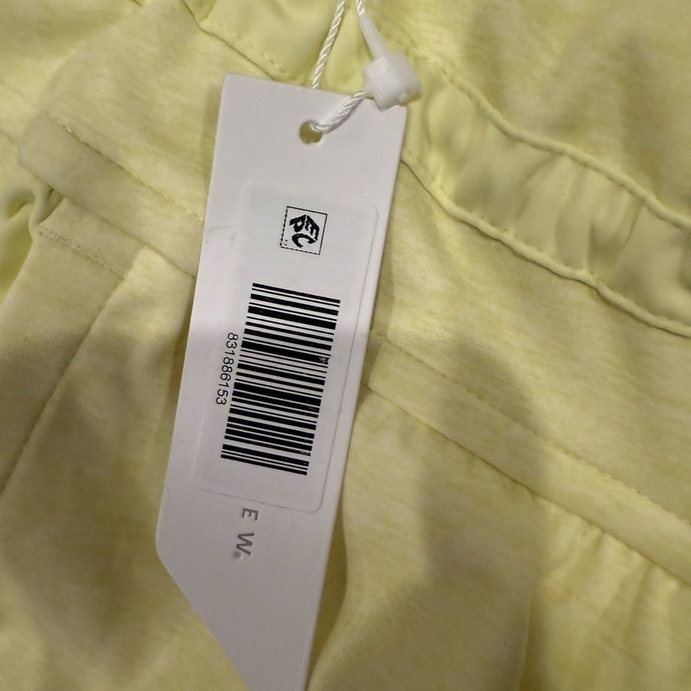 Travis Mathew's Yellow High-Waisted Athletic Shorts with Drawstring & Pockets - Picture 4 of 10